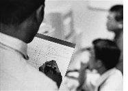 man taking notes